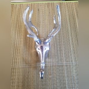 Silver toned metal hook